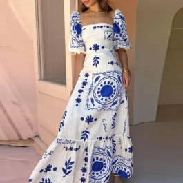 Elera Przepiękna sukienka z bufiastymi rękawkami niebieska